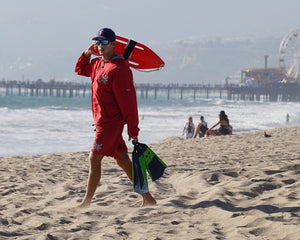 Lifeguard wearing reef safe, colorful and very cool NOZ sunscreen, ecofriendly and the coolest sunscreen available. Dermatologist recommended!